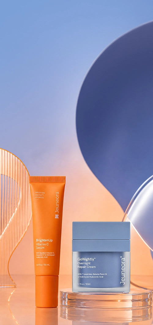 BrightenUp Vitamin C Serum and GoNightly Overnight Repair Cream on a blue and orange backdrop