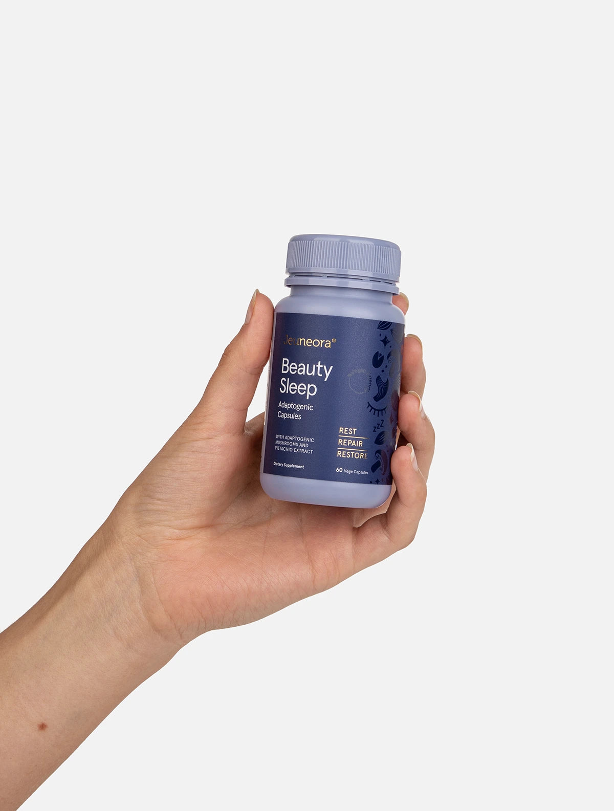 Hand holding Jeuneora Beauty Sleep Capsules bottle