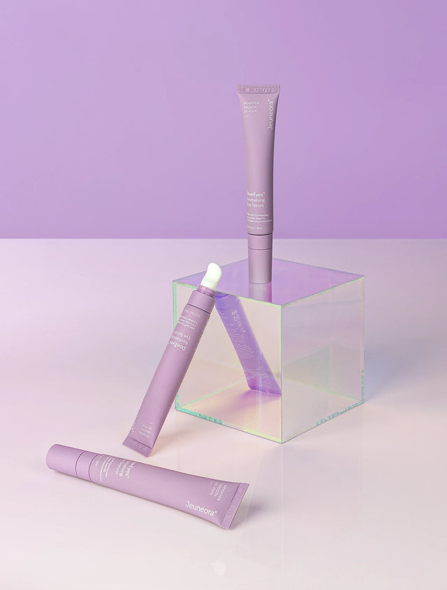 DoeEyes eye serum tubes on holographic cube and purple background