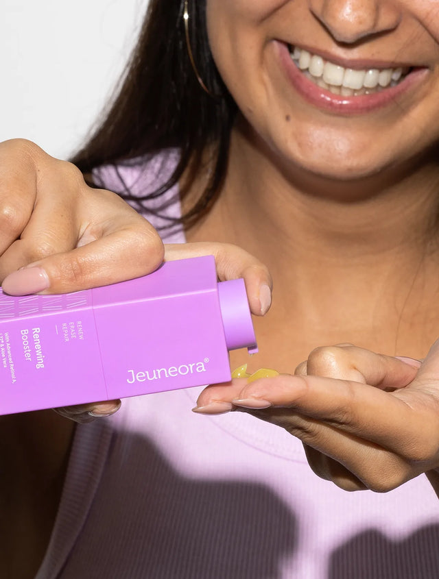 Woman pumping product from Jeuneora Renewing Booster Advanced Retinol Serum